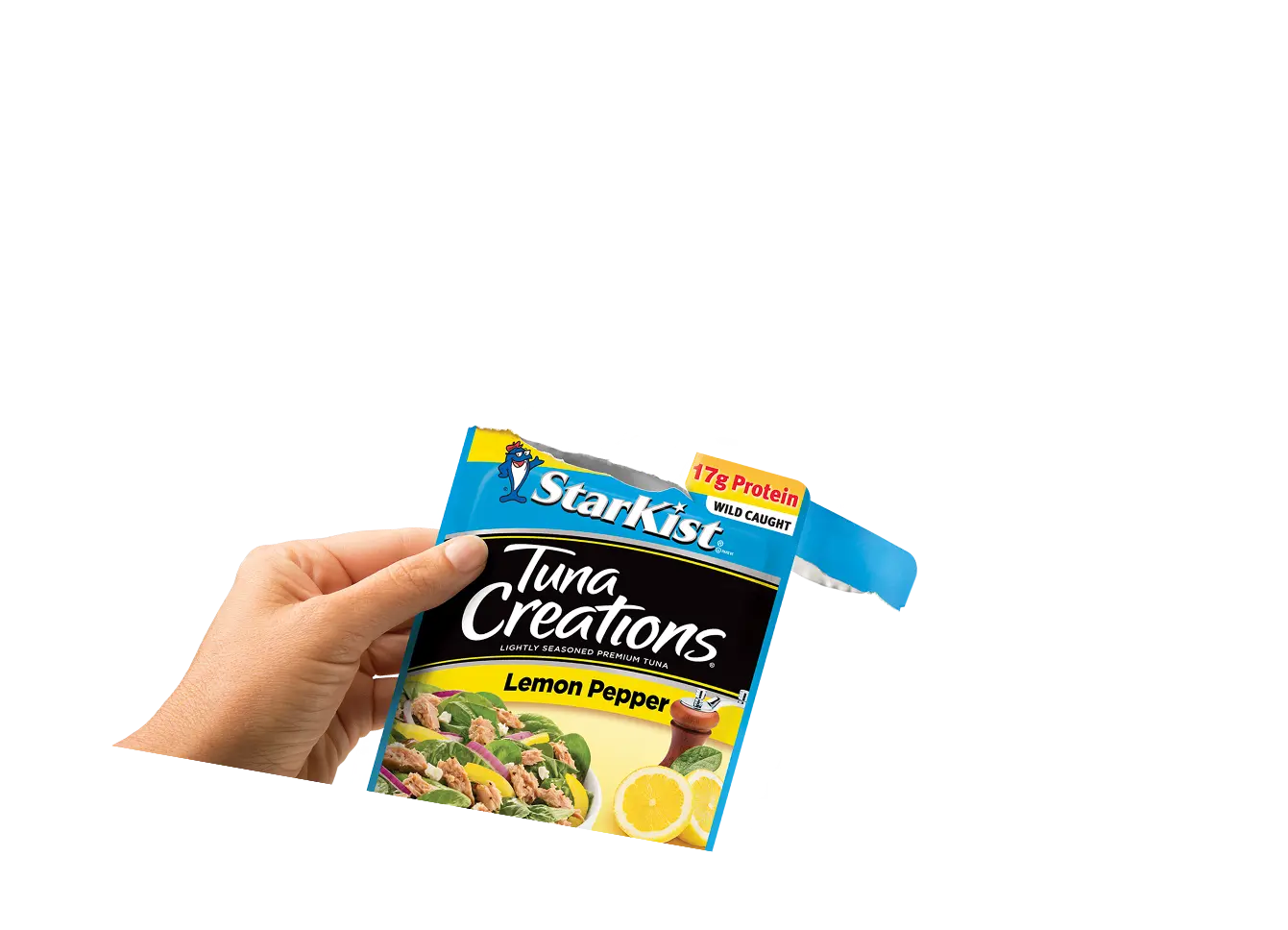 Mano sosteniendo un pouch de Starkist Tuna Creations