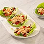 Envueltos de lechuga con pollo y ensalada griega